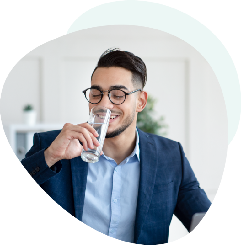 Executive enjoying a glass of water