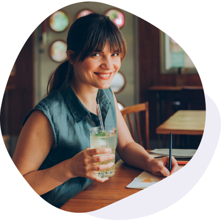 Woman with glass of ice cold water