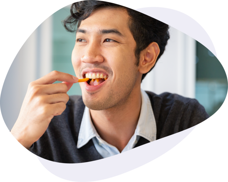 man enjoying a break room snack in the office